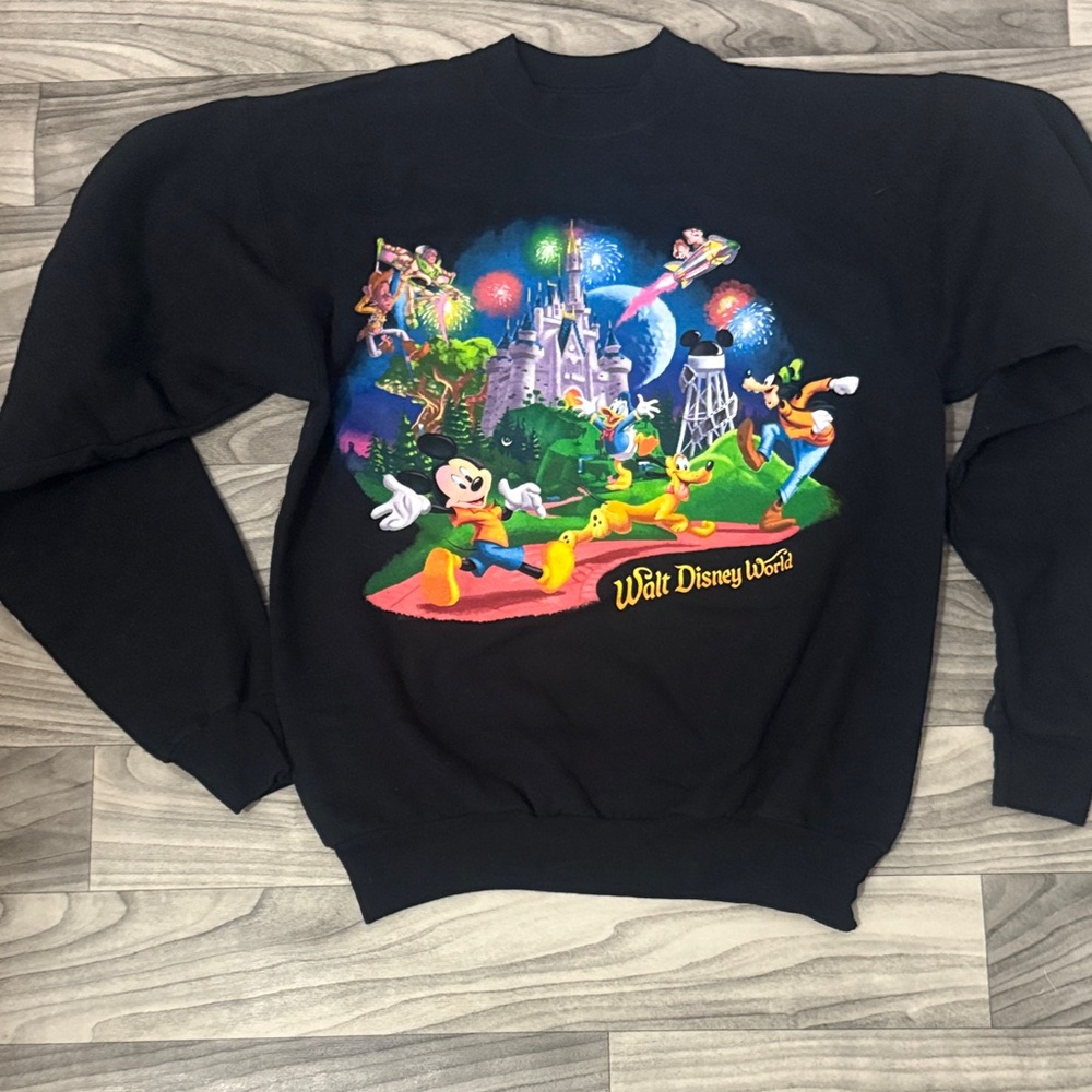 Vintage Disney Black Sweatshirt with Colorful Character & Castle Design
